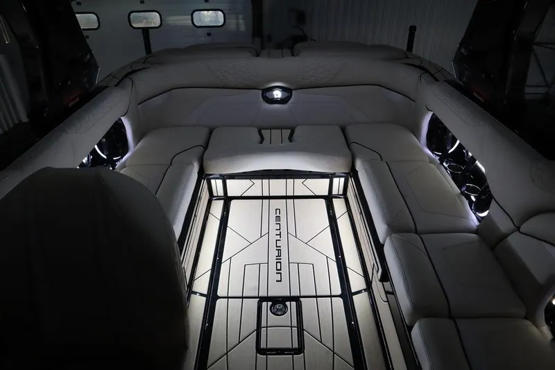 Slide: The Image of 2024 Centurion Ri230 boat interior with illuminated seating and sleek design. - 15