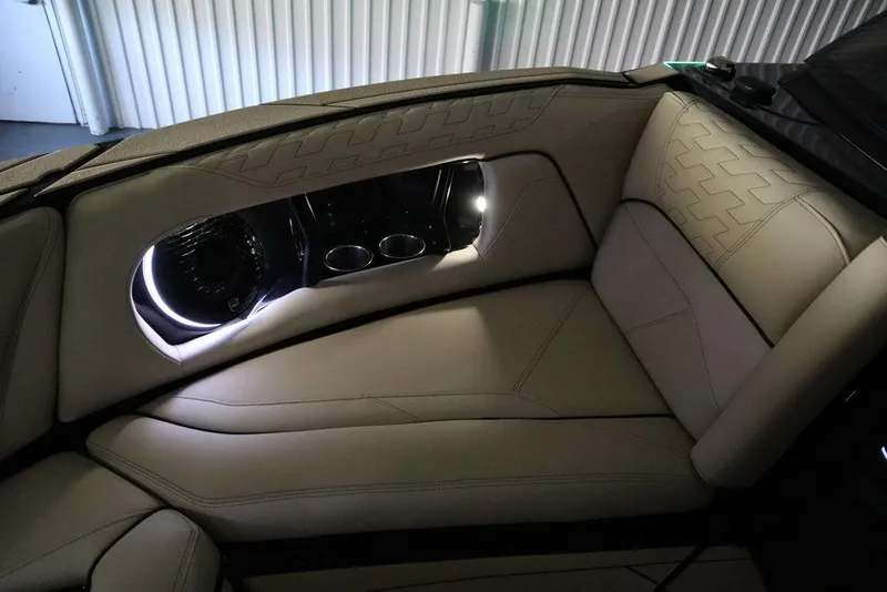 Slide: The Image of Luxurious interior of 2024 Centurion Ri230 boat with ambient lighting and plush seating. - 20