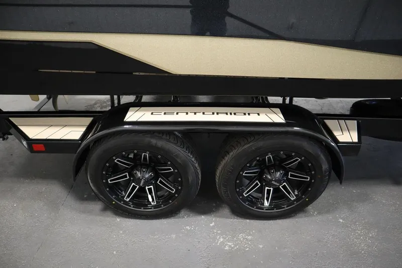 Slide: The Image of 2024 Centurion Ri230 trailer with stylish black wheels and sleek design. - 25