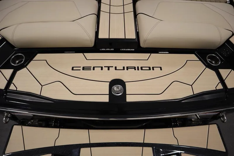 Slide: The Image of 2024 Centurion Ri230 boat deck with beige and black design. - 33
