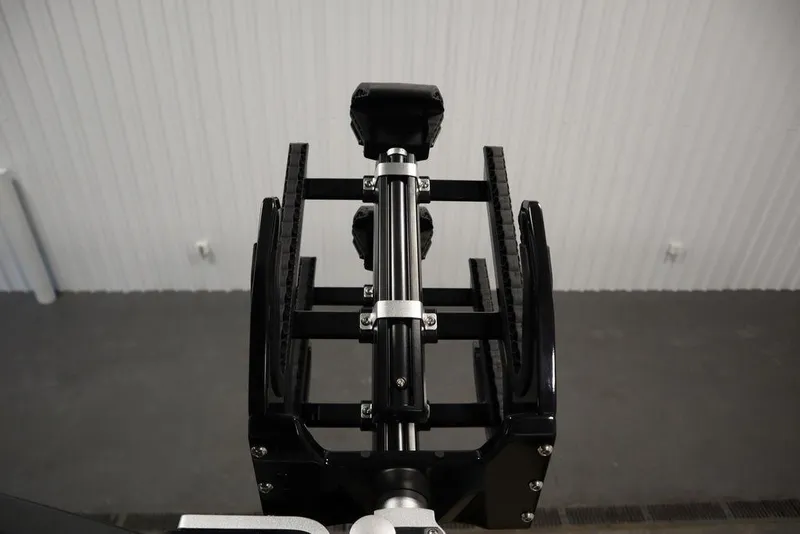 Slide: The Image of Centurion Ri230 2024 boat component, featuring a hydraulic mechanism in a workshop setting. - 44