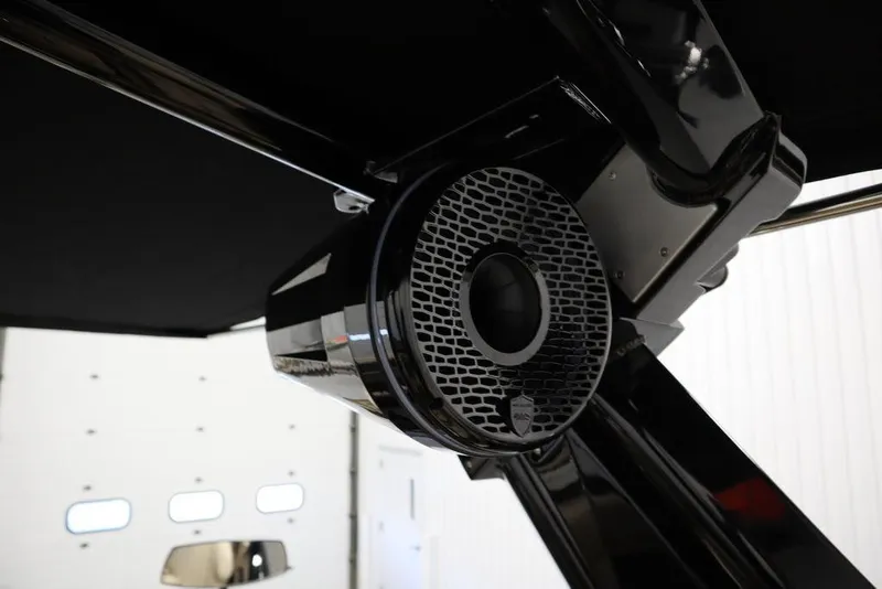 Slide: The Image of 2024 Centurion Ri230 boat speaker system, sleek black design. - 46
