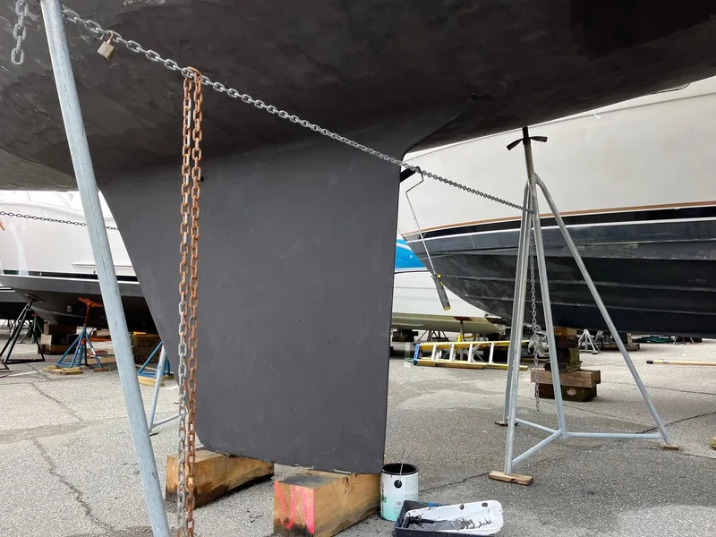 Slide: The Image of 1987 Hunter Legend 37 sailboat keel in dry dock for maintenance. - 4