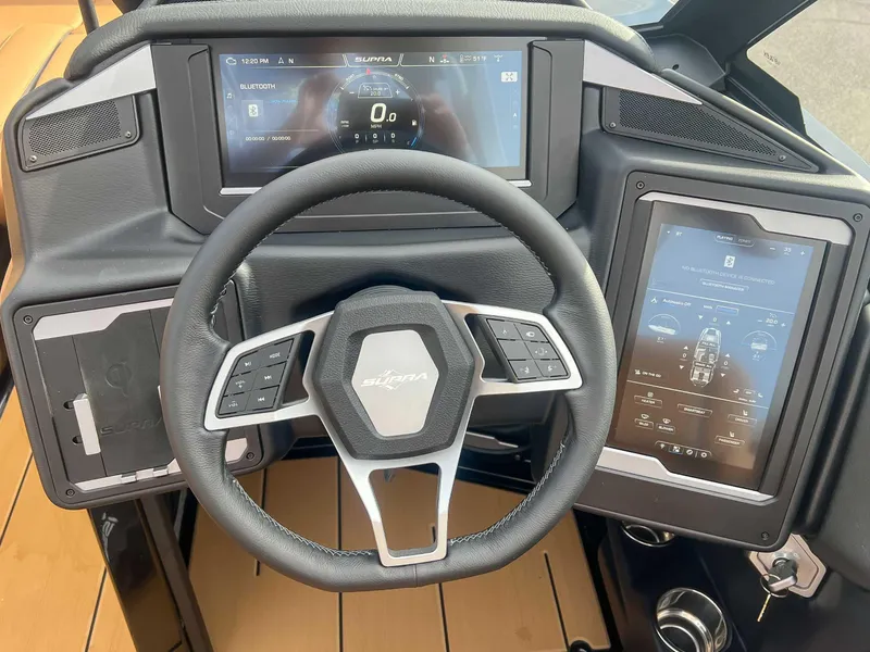Slide: The Image of 2024 Supra SA dashboard with advanced digital displays and steering wheel controls. - 15