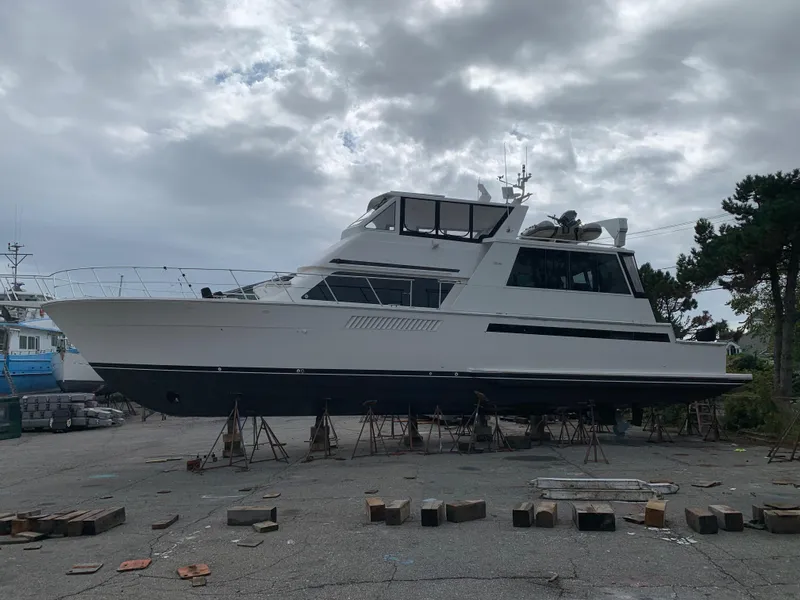 Slide: The Image of 1998 Viking 60 CMY yacht on dry dock for maintenance. - 11
