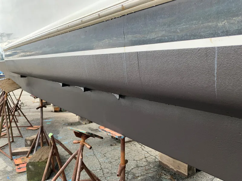 Slide: The Image of 1998 Viking 60 CMY yacht hull on stands during maintenance. - 13