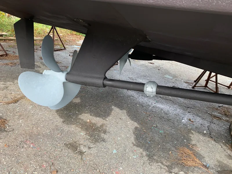 Slide: The Image of Propeller and rudder of a 1998 Viking 60 CMY yacht on dry dock. - 14