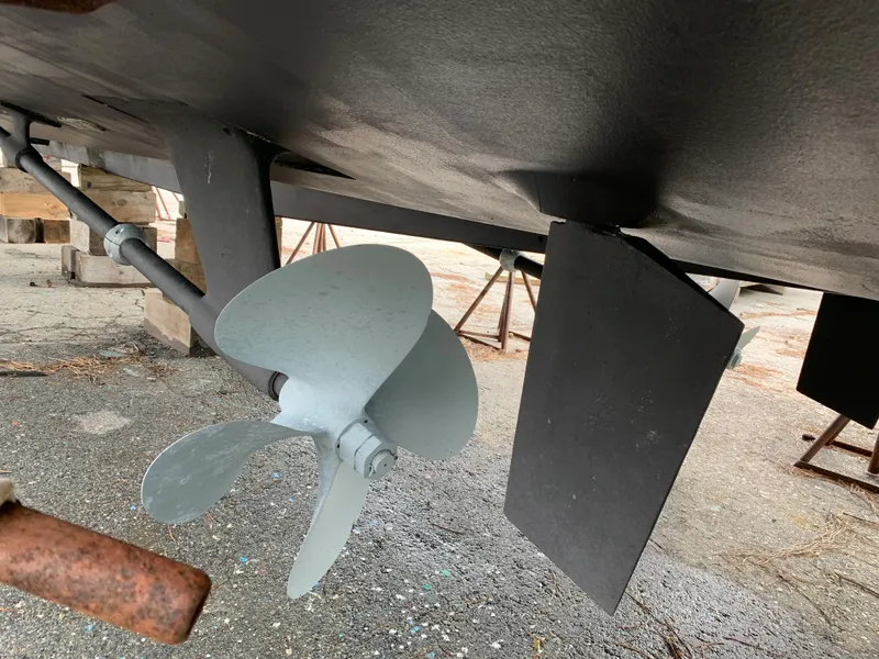 Slide: The Image of Close-up of the propeller and rudder of a 1998 Viking 60 CMY yacht. - 17