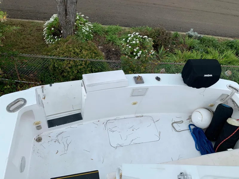 Slide: The Image of Top view of a 1998 Viking 60 CMY boat deck with various equipment. - 23