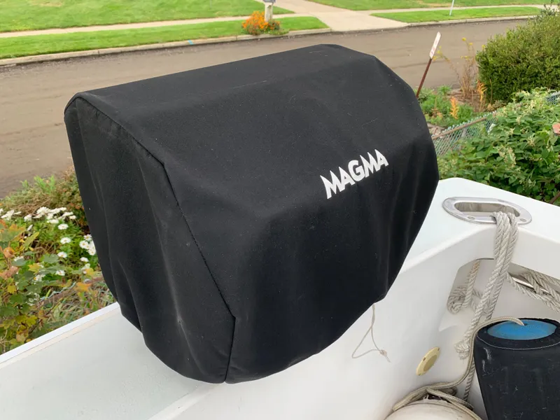 Slide: The Image of Black Magma grill cover on a 1998 Viking 60 CMY boat. - 26