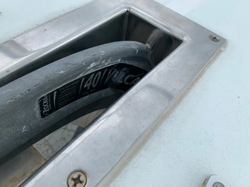 Slide: The Image of Close-up of Viking 60 CMY 1998 boat cleat with attached rope. - 36