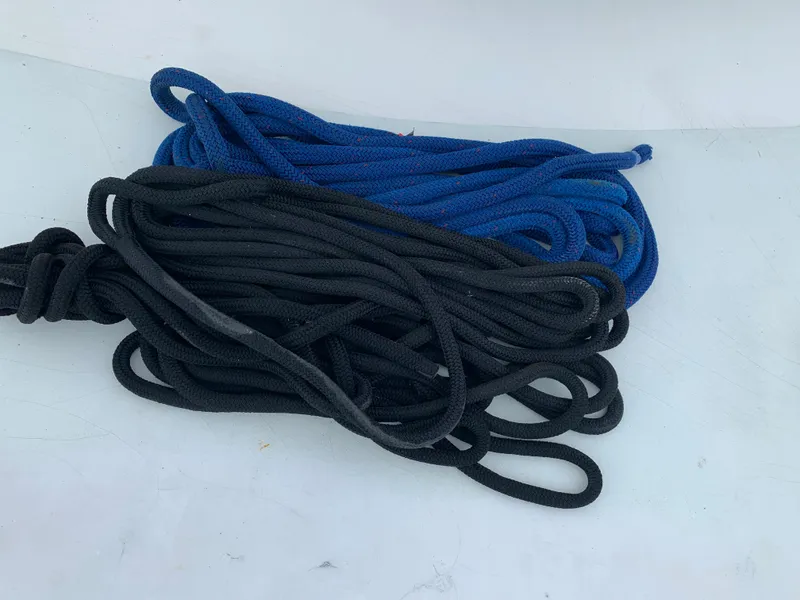 Slide: The Image of Blue and black ropes on a white surface, Viking 60 CMY 1998. - 37