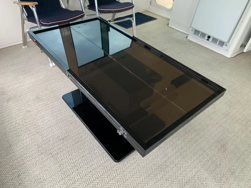 Slide: The Image of Black glass table on a Viking 60 CMY yacht, 1998 model. - 44
