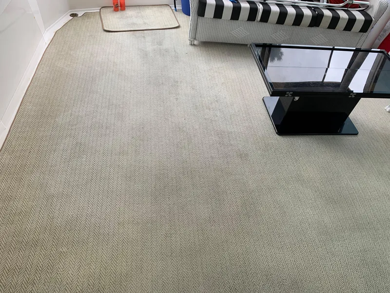 Slide: The Image of 1998 Viking 60 CMY interior with carpet, black glass table, and striped sofa. - 48