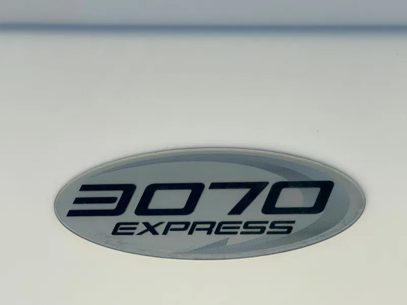Slide: The Image of 2005 Pursuit 3070 Offshore Express boat emblem - 25