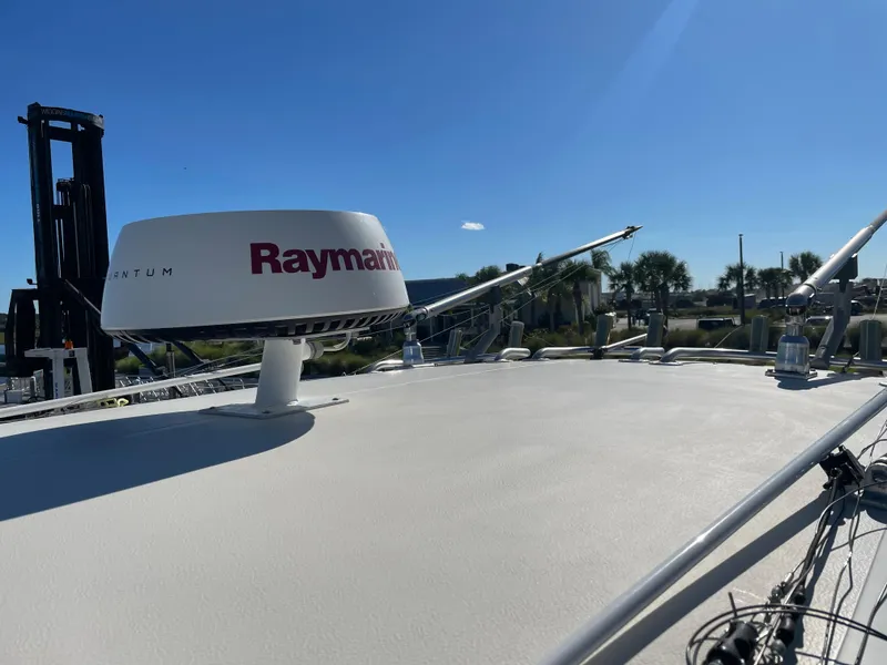 Slide: The Image of 2005 Pursuit 3070 Offshore boat with Raymarine radar system. - 29