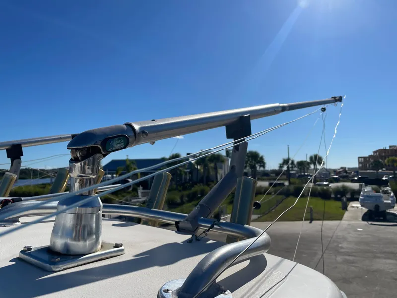 Slide: The Image of Close-up of 2005 Pursuit 3070 Offshore boat's fishing rod holder and rigging. - 32