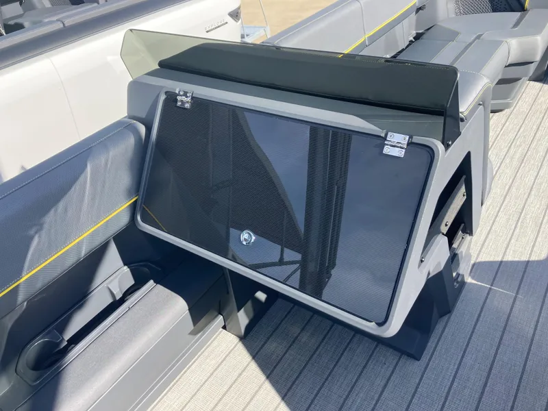 Slide: The Image of 2024 Manitou Explorer 24 Switchback 24 MAX Trifold Stealth interior seating and storage. - 10