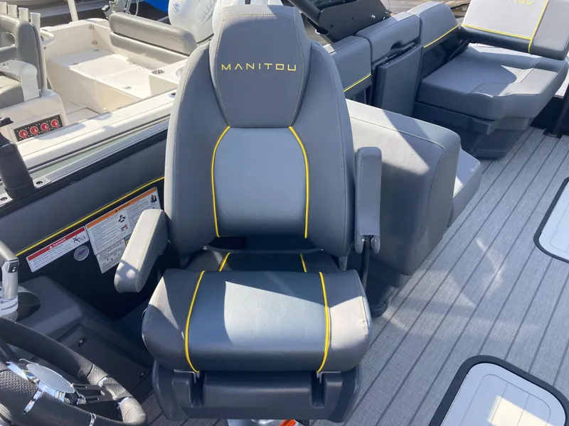 Slide: The Image of 2024 Manitou Explorer 24 Switchback 24 MAX Trifold Stealth captain's chair with yellow accents. - 8