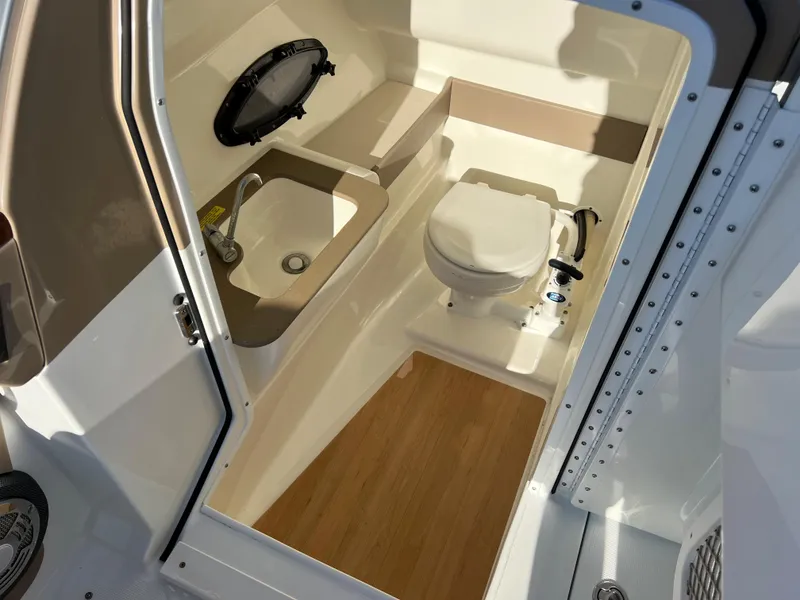 Slide: The Image of 2013 Formula 270 Bowrider boat bathroom with sink and toilet. - 41