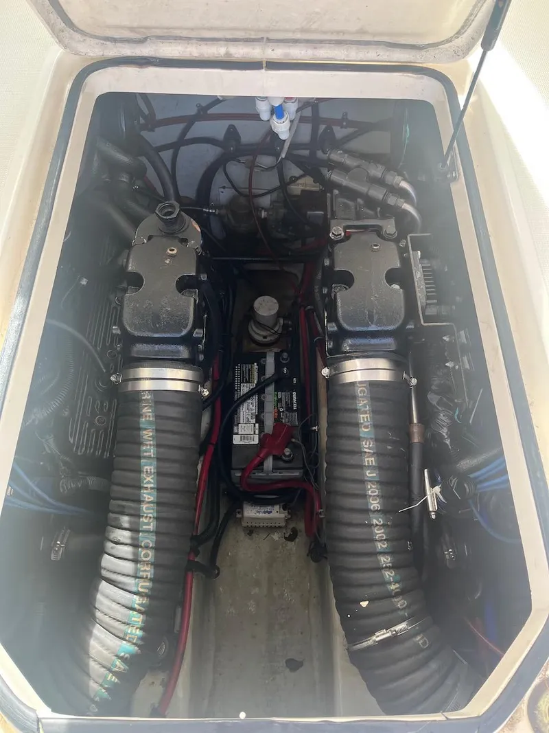 Slide: The Image of Engine compartment of a 2000 Pursuit 3000 Express boat. - 30
