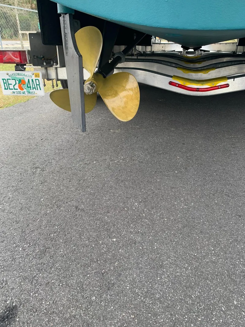 Slide: The Image of Propeller and stern of a 2000 Pursuit 3000 Express boat on a trailer. - 31