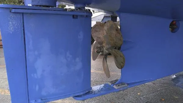Slide: The Image of Close-up of 2007 Custom Rockport Steel Trawler MY propeller and rudder. - 11