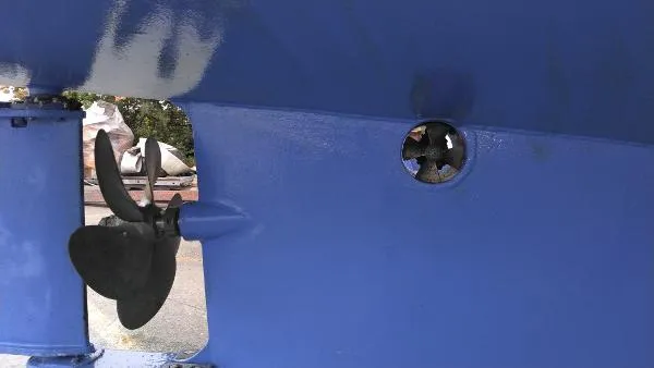 Slide: The Image of Close-up of the propeller and thruster on a 2007 Custom Rockport Steel Trawler MY. - 12