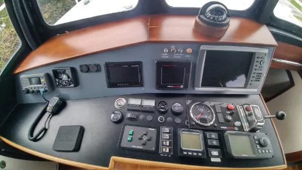 Slide: The Image of Control panel of a 2007 Custom Rockport Steel Trawler MY with navigation instruments. - 31