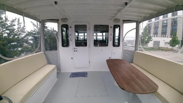 Slide: The Image of Interior of 2007 Custom Rockport Steel Trawler MY with seating and table. - 34