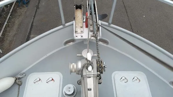 Slide: The Image of Bow of 2007 Custom Rockport Steel Trawler MY with anchor winch and deck hatches. - 37