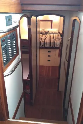 Slide: The Image of Interior cabin of 2007 Custom Rockport Steel Trawler MY with bed and control panel. - 46