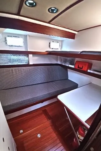 Slide: The Image of 2007 Custom Rockport Steel Trawler MY cabin with seating and table - 47