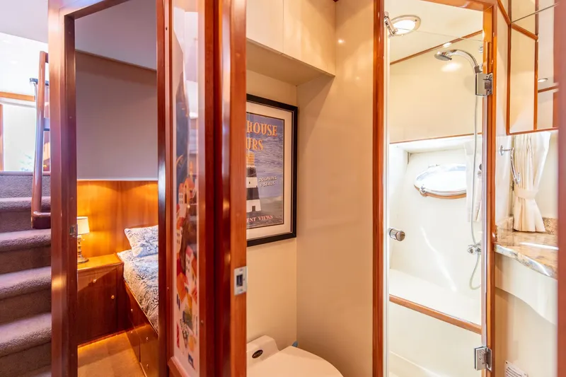 Slide: The Image of 2003 Ocean Alexander 48 Sedan interior with bedroom and bathroom. - 21