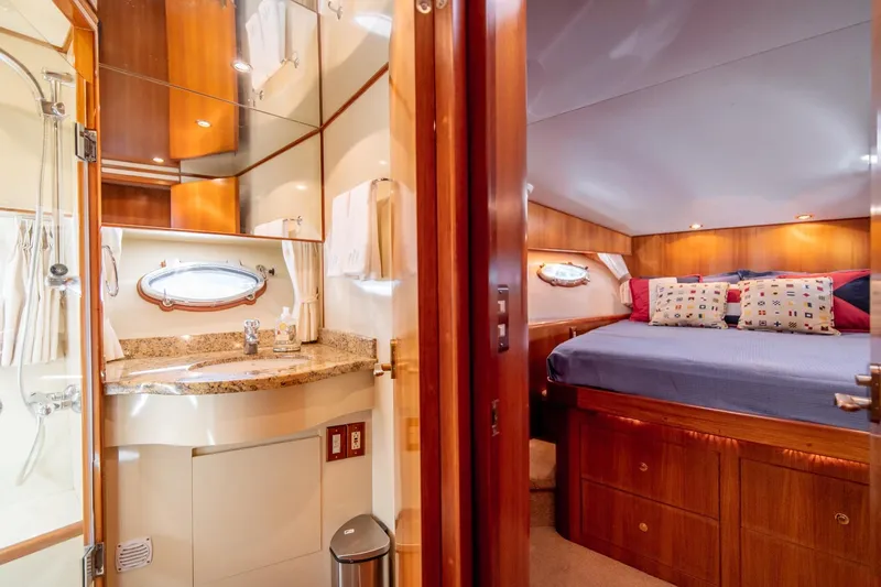 Slide: The Image of Luxurious cabin interior of 2003 Ocean Alexander 48 Sedan yacht with ensuite bathroom. - 23