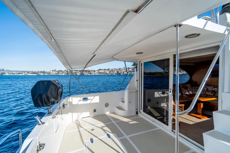 Slide: The Image of 2003 Ocean Alexander 48 Sedan yacht deck with ocean view. - 6