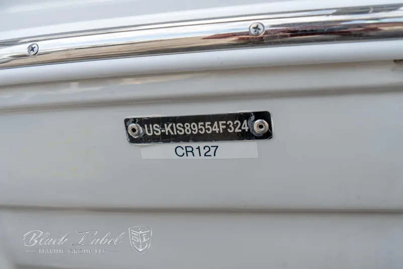 Slide: The Image of 2024 Crownline E305 XS boat identification plate with serial number. - 6