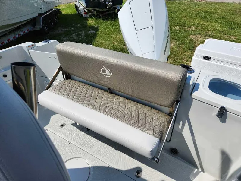 Slide: The Image of 2024 Finseeker 210 FinSeeker boat seating and storage area. - 8