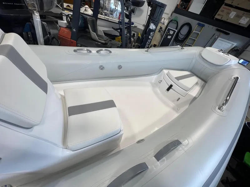 Slide: The Image of 2024 AB Inflatables 15 OCEANUS VST inflatable boat interior with white seating. - 4