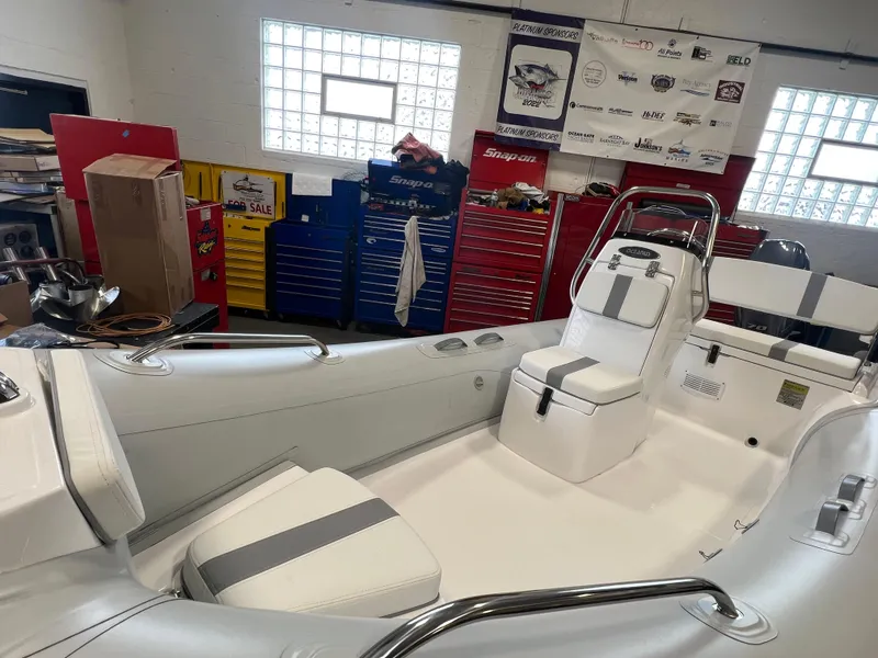 Slide: The Image of 2024 AB Inflatables 15 OCEANUS VST boat interior in a workshop. - 5