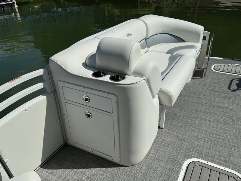 Slide: The Image of 2024 JC Neptoon Sport 23TT DSL pontoon boat with luxurious seating and storage. - 11