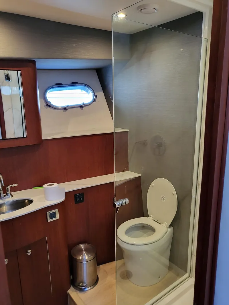 Slide: The Image of Bathroom interior of 2005 Pacific Mariner 65 SE Motoryacht with modern fixtures. - 23