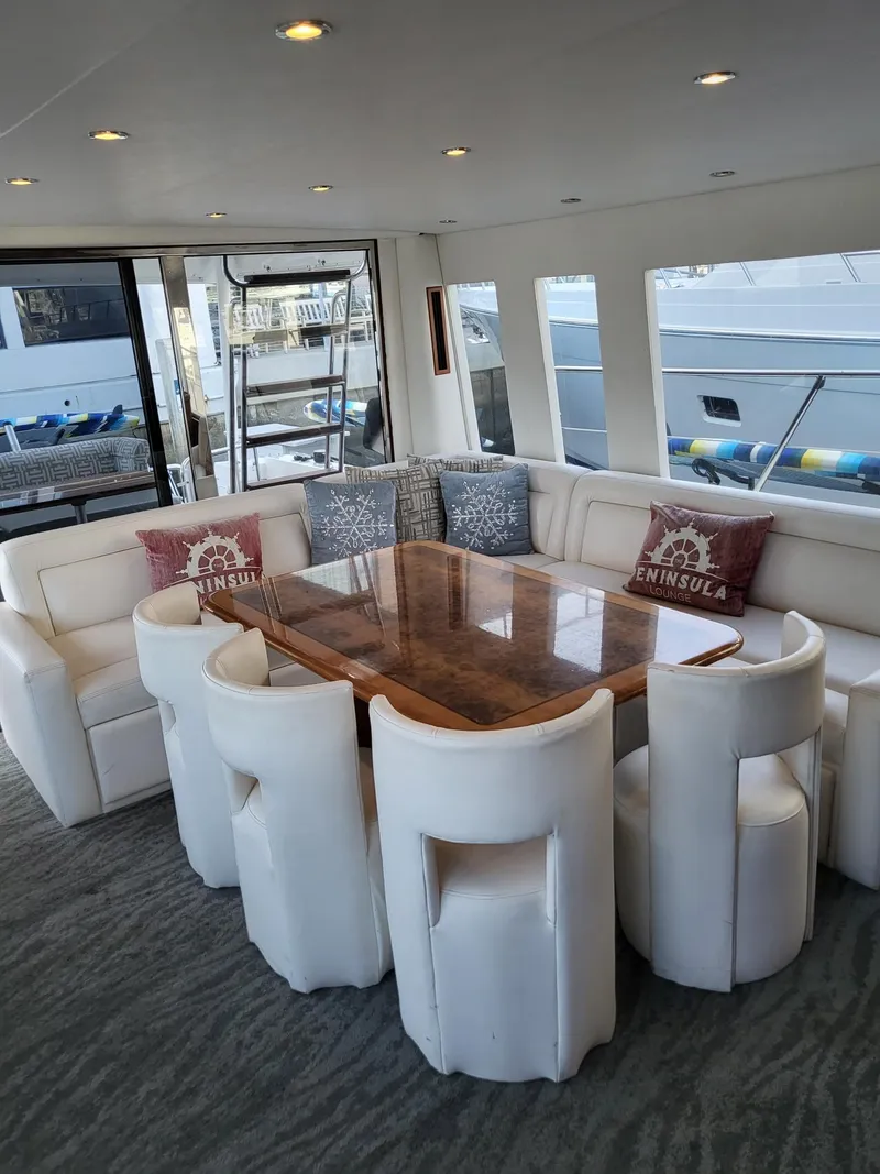 Slide: The Image of Luxurious interior of a 2005 Pacific Mariner 65 SE Motoryacht with elegant dining area. - 4
