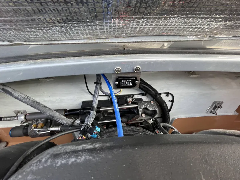 Slide: The Image of Engine compartment of a 2011 Chris-Craft Silver Bullet 20 boat. - 21