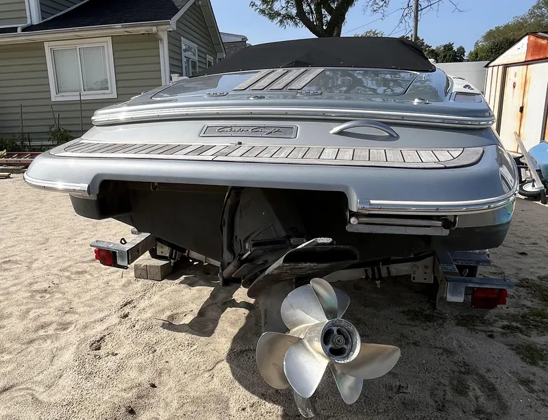 Slide: The Image of 2011 Chris-Craft Silver Bullet 20 boat on trailer, rear view with propeller. - 4