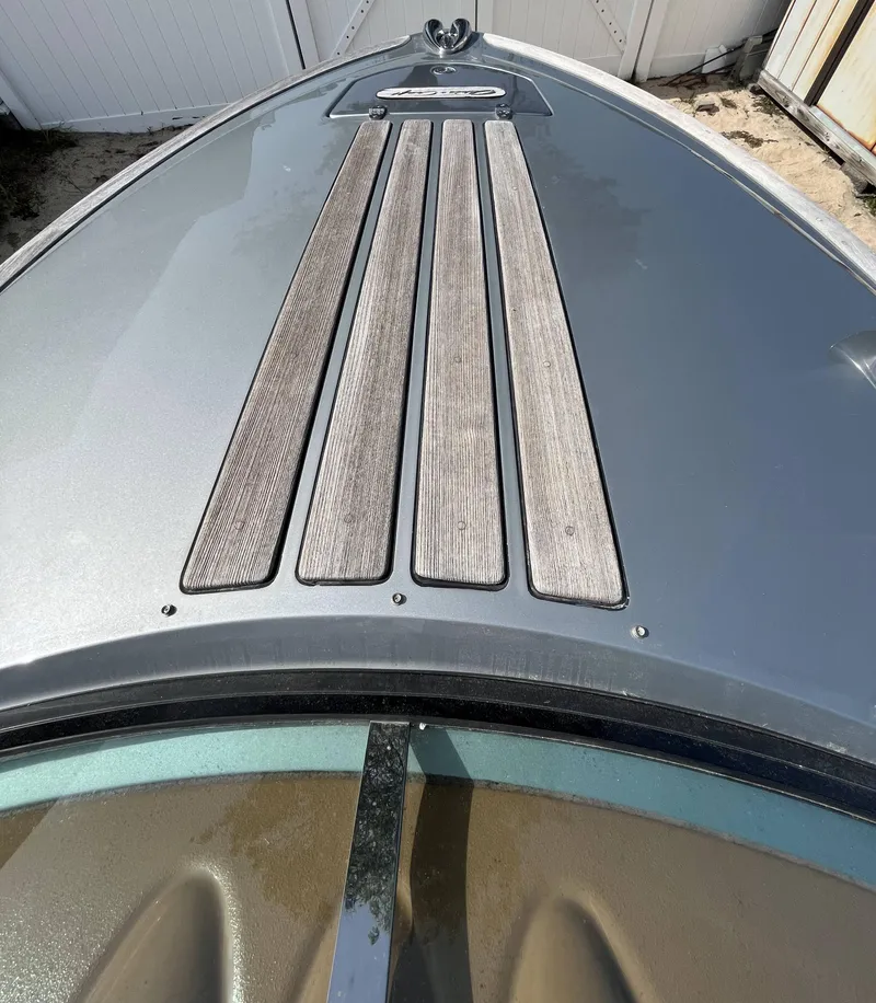 Slide: The Image of 2011 Chris-Craft Silver Bullet 20 boat deck with wood accents. - 6