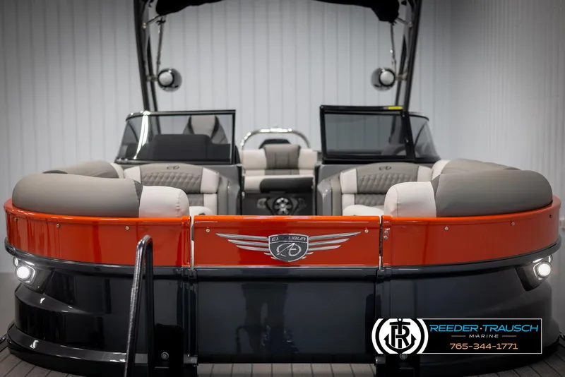 Slide: The Image of 2024 Avalon 2785 Excalibur EL pontoon boat with luxurious seating and modern design. - 17