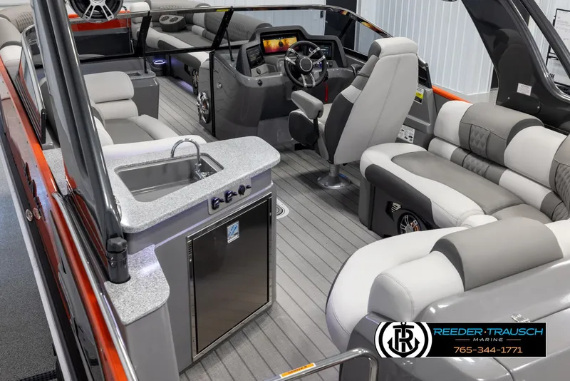 Slide: The Image of 2024 Avalon 2785 Excalibur EL boat interior with luxury seating and modern amenities. - 19