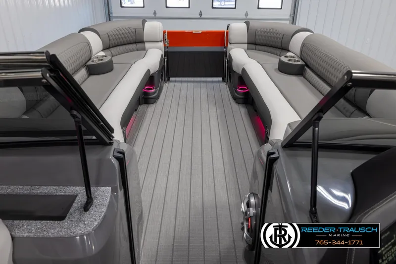 Slide: The Image of 2024 Avalon 2785 Excalibur EL pontoon boat interior with luxurious seating and modern design. - 24