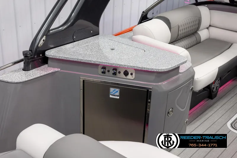 Slide: The Image of 2024 Avalon 2785 Excalibur EL boat interior with seating and kitchenette. - 39